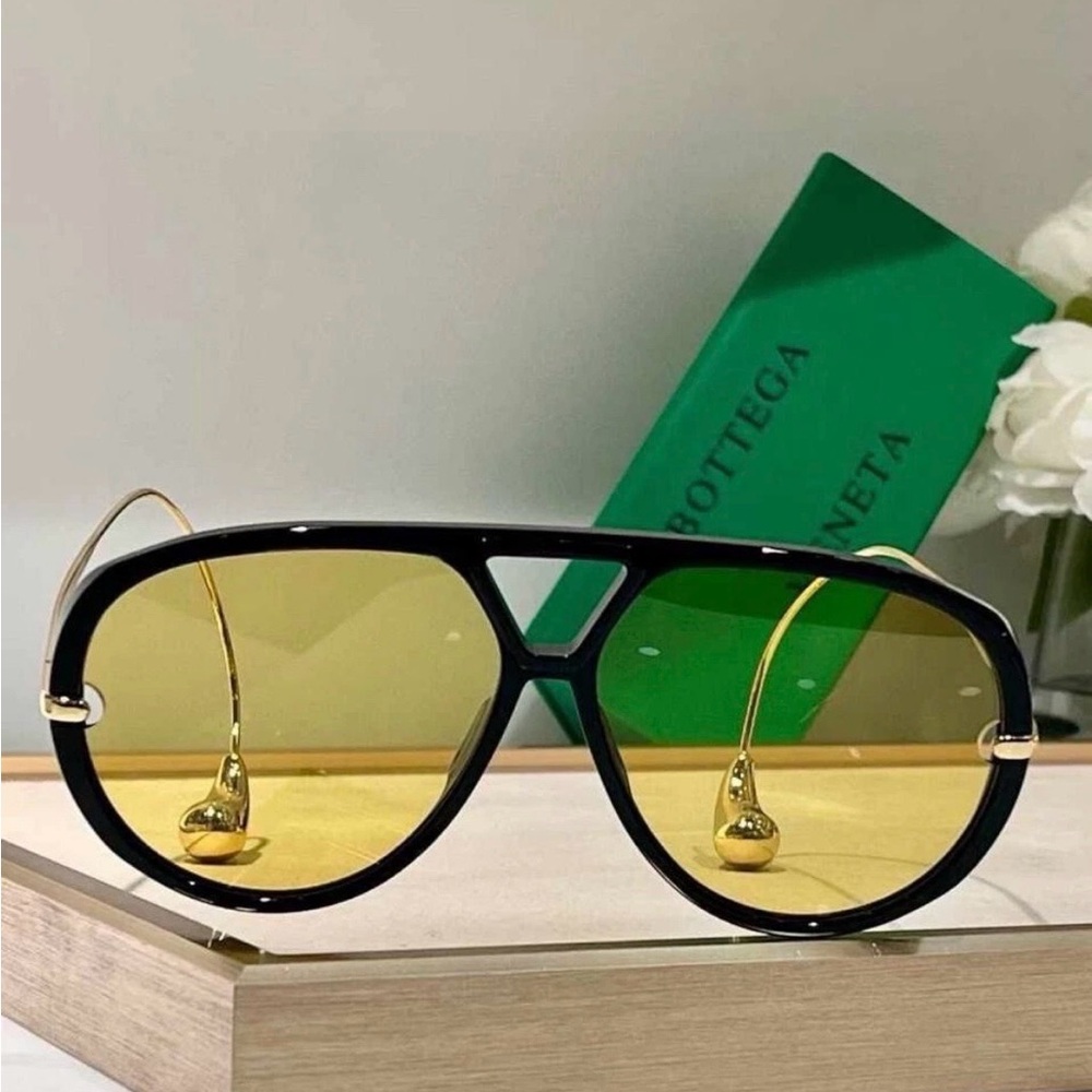 Bottega Veneta Black Frame Sunglasses with Gold Accents